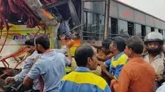 Two killed as private bus collides with lorry while trying to overtake