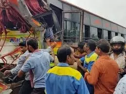 Two killed as private bus collides with lorry while trying to overtake Two killed as private bus collides with lorry while trying to overtake