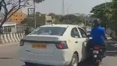 Road Rage in Bangalore| ಕೆ.ಆರ್.ಪುರಂ ಫ್ಲೈಓವರ್‌ನಲ್ಲಿ ಬೈಕ್‌ಗೆ ಉದ್ದೇಶಪೂರ್ವಕವಾಗಿ ಡಿಕ್ಕಿ ಹೊಡೆದ ಕ್ಯಾಬ್‌ ಚಾಲಕ